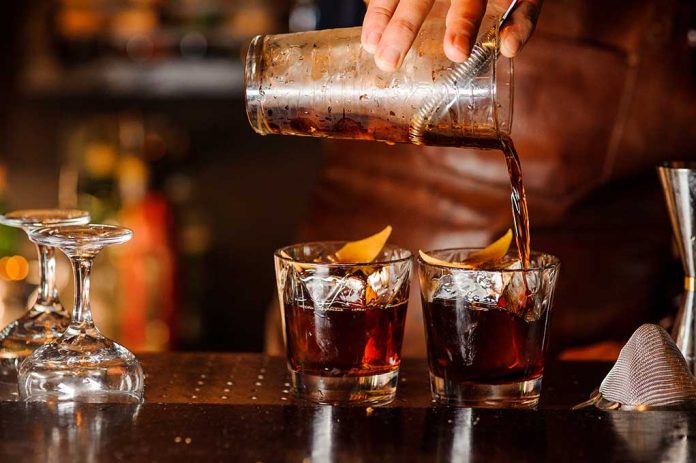 Bartender pouring cocktails