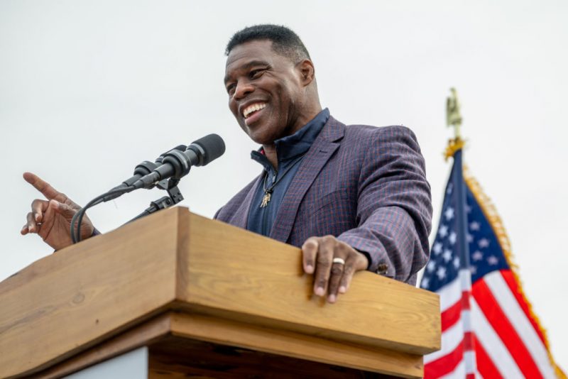 MCDONOUGH, GEORGIA - NOVEMBER 16: Republican U.S. Senate candidate Herschel Walker speaks to supporters at a campaign rally on November 16, 2022 in McDonough, Georgia. Walker, the University of Georgia Heisman Trophy winner and former NFL running back, continues campaigning across the state ahead of a runoff election against incumbent Sen. Raphael Warnock (D-GA) on December 6. (Photo by Brandon Bell/Getty Images)