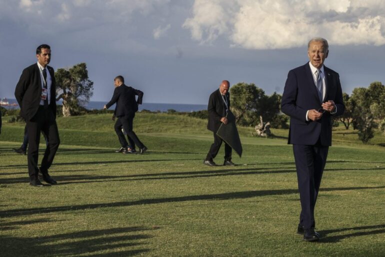 President Joe Biden leaves San Domenico Golf Club, following a parachute drop demonstration by Italian Army, during the first day of the G7 meeting at Borgo Egnazia resort, on June 13, 2024 in Fasano, Italy.