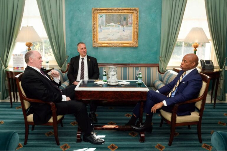 New York Mayor Eric Adams, right, meeting with President-elect Donald Trump's incoming "border czar" Tom Homan, left, and President Joe Biden's Department of Homeland Security Official Kenneth Genalo at Gracie Mansion, in New York, Thursday, Dec. 12, 2024. (