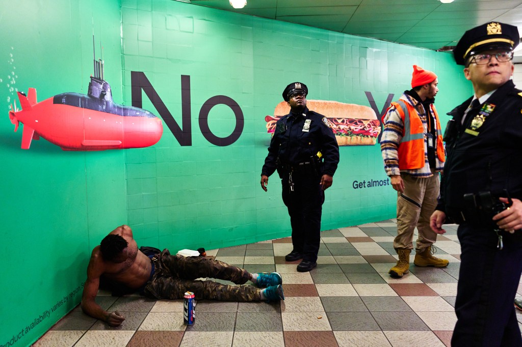 Police and city outreach workers from a PATH team roam Herald Square Station to offer the homeless shelter and city services.