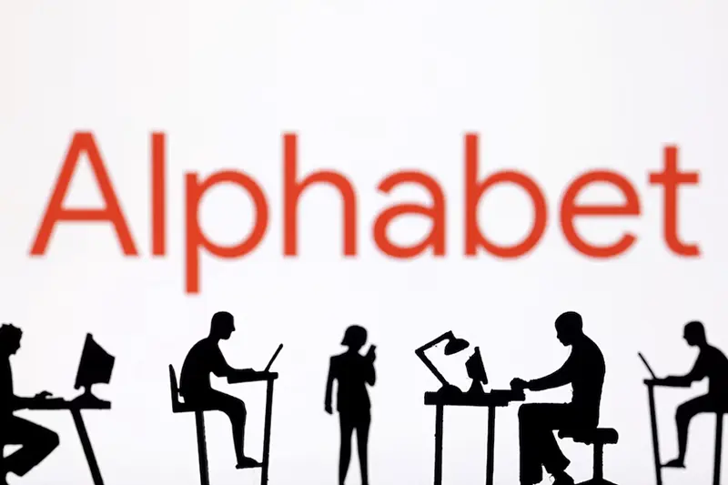 Figurines with computers and smartphones are seen in front of Alphabet logo in this illustration taken, February 19, 2024. REUTERS/Dado Ruvic/Illustration