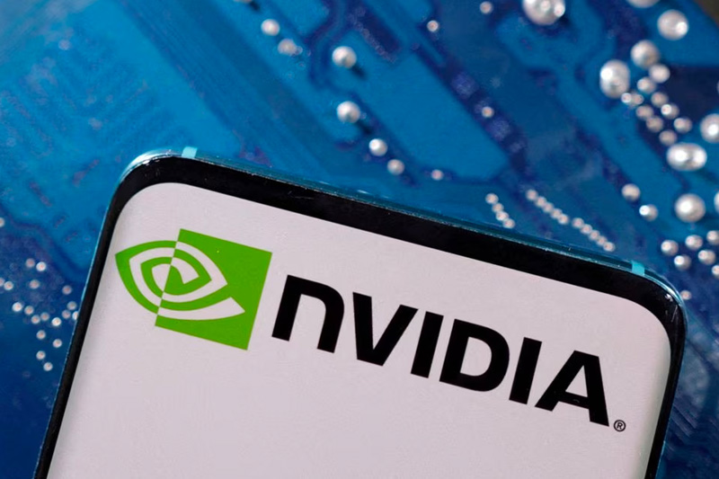 A smartphone with a displayed NVIDIA logo is placed on a computer motherboard in this illustration taken March 6, 2023. REUTERS/Dado Ruvic/Illustration/File Photo