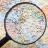 Magnifying glass over the Middle East and Egypt.