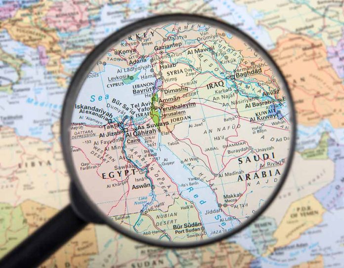 Magnifying glass over the Middle East and Egypt.