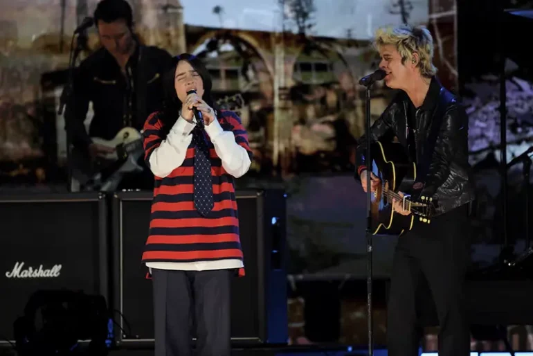 Billie Joe Armstrong of Green Day and Billie Eilish perform during the FireAid benefit concert for Los Angeles wildfire relief efforts, in Inglewood, California, U.S., January 30, 2025. REUTERS/Daniel Cole