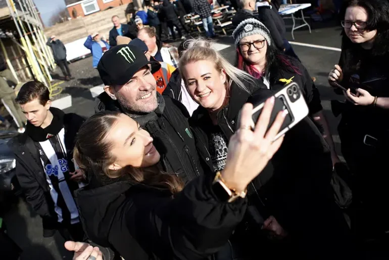 Boyzone member Shane Lynch poses for a selfie with fans before the match Action Images/Craig Brough/File Photo