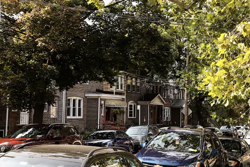 A row of residential houses stands in Queens' neighborhood of Ridgewood, New York, U.S., September 16, 2022. REUTERS/Amr AlfikyFile Photo