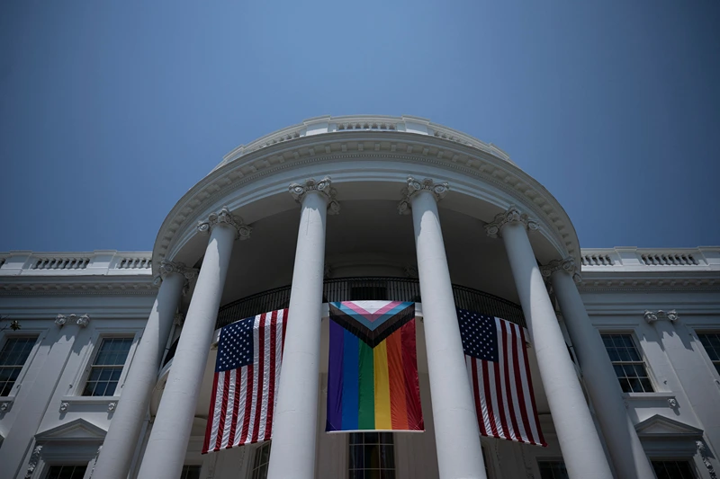 TOPSHOT - A Pride flag is displayed during a Pride celebration on the South Lawn of the White House in Washington, DC, on June 10, 2023. (Photo by Brendan Smialowski / AFP) (Photo by BRENDAN SMIALOWSKI/AFP via Getty Images)