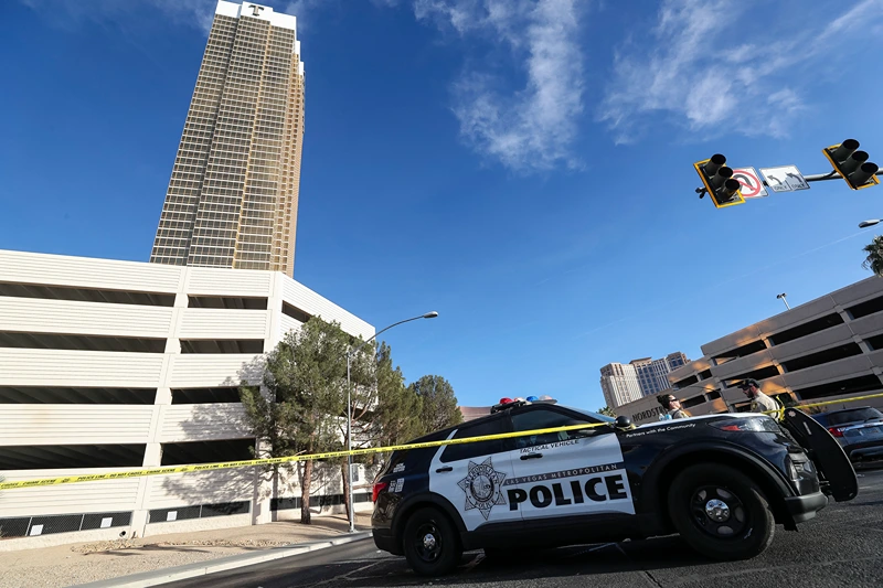 Police block an area where a Tesla Cybertruck caught fire and exploded outside the lobby of President-elect Donald Trump's hotel, on January 1, 2025, in Las Vegas. At least one person was killed and seven wounded when a Tesla Cybertruck exploded outside a hotel belonging to US President-elect Donald Trump in Las Vegas, police said Wednesday. (Photo by WADE VANDERVORT / AFP) (Photo by WADE VANDERVORT/AFP via Getty Images)