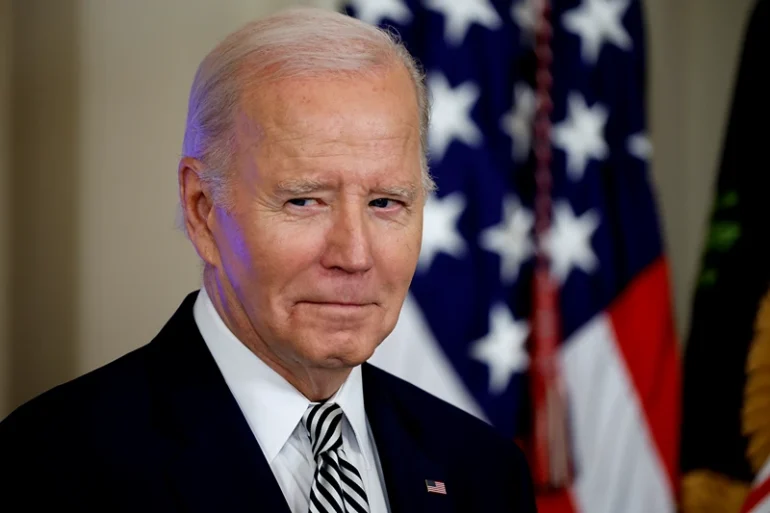 WASHINGTON, DC - OCTOBER 30: U.S. President Joe Biden listens as Vice President Kamala Harris introduces him during an event about his administration's approach to artificial intelligence in the East Room of the White House on October 30, 2023 in Washington, DC. President Biden issued a new executive order on Monday, directing his administration to create a new chief AI officer, track companies developing the most powerful AI systems, adopt stronger privacy policies and "both deploy AI and guard against its possible bias," creating new safety guidelines and industry standards. (Photo by Chip Somodevilla/Getty Images)