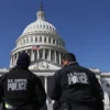 F U.S. Capitol police officers gather on the east front plaza of the Capitol on February 28, 2022 in Washington, DC. Security has been heightened and fencing was erected around the U.S. Capitol ahead of U.S. President Joe Biden's State of the Union address on Tuesday evening. (Photo by Justin Sullivan/Getty Images)