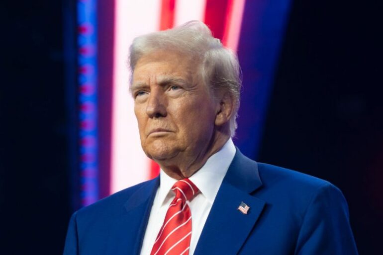 PHOENIX, ARIZONA - DECEMBER 22: U.S. President-elect Donald Trump looks on during Turning Point USA's AmericaFest at the Phoenix Convention Center on December 22, 2024 in Phoenix, Arizona. The annual four day conference geared toward energizing and connecting conservative youth hosts some of the country's leading conservative politicians and activists. (Photo by Rebecca Noble/Getty Images)