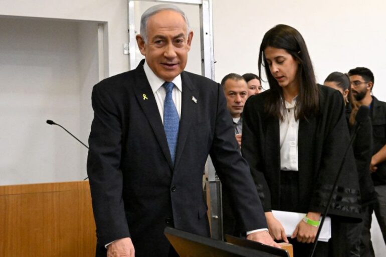 Israeli Prime Minister Benjamin Netanyahu attends the fifth day of testimony in his trial on corruption charges at the district court in Tel Aviv on December 23, 2024. (Photo by DEBBIE HILL / POOL / AFP) (Photo by DEBBIE HILL/POOL/AFP via Getty Images)