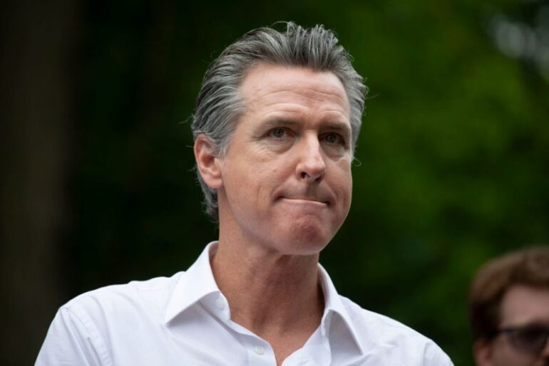 SOUTH HAVEN, MICHIGAN - JULY 4:  California Gov. Gavin Newsom campaigns for President Joe Biden at the Van Buren County Democratic Party's "BBQ for Biden-Harris" event on July 4, 2024 in South Haven, Michigan. Gov. Newsom's name has been mentioned as a possible replacement for President Biden should the President decide to not run for re-election following his recent debate performance against former President Donald Trump.  (Photo by Bill Pugliano/Getty Images)