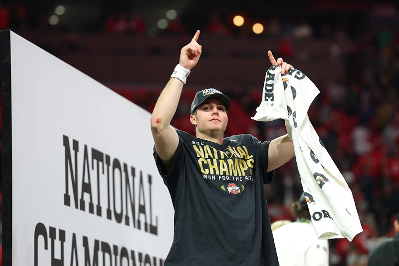 Will Howard #18 of the Ohio State Buckeyes celebrates after beating the Notre Dame Fighting Irish 34-23 in the 2025 CFP National Championship at the Mercedes-Benz Stadium on January 20, 2025 in Atlanta, Georgia. (Photo by Kevin C. Cox/Getty Images)