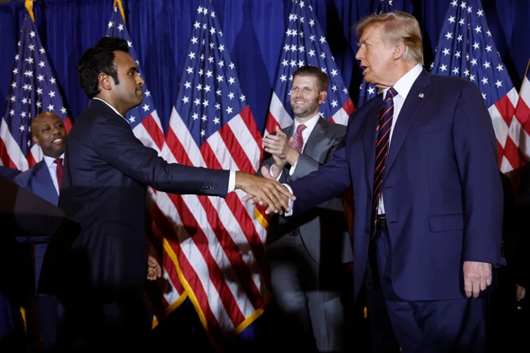 NASHUA, NEW HAMPSHIRE - JANUARY 23: Republican presidential candidate and former U.S. President Donald Trump (R) shakes hands with former candidate Vivek Ramaswamy during a primary night party at the Sheraton on January 23, 2024 in Nashua, New Hampshire. New Hampshire voters cast their ballots in their state’s primary election today, with former President Donald Trump winning the primary, finishing ahead of former UN Ambassador Nikki Haley. (Photo by Chip Somodevilla/Getty Images)