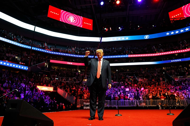 WASHINGTON, DC - JANUARY 19: President-Elect Donald Trump gestures to the crowd after his victory rally at the Capital One Arena on January 19, 2025 in Washington, DC. Trump will be sworn in as the 47th U.S. president on January 20. (Photo by Anna Moneymaker/Getty Images)