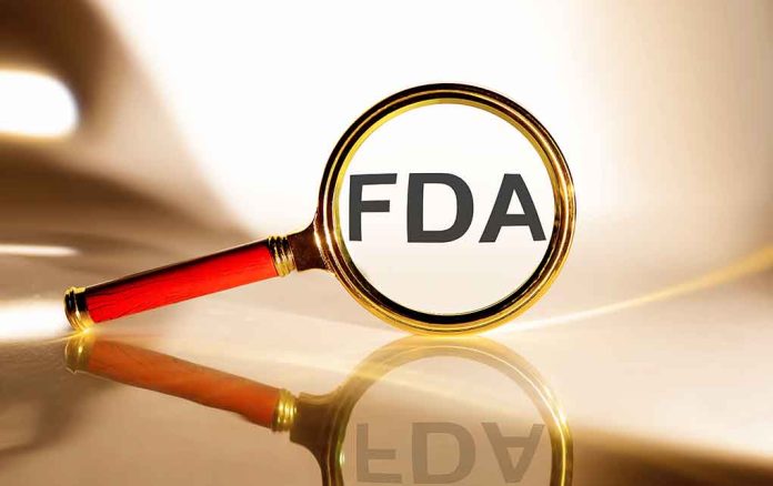 FDA under magnifying glass gold background