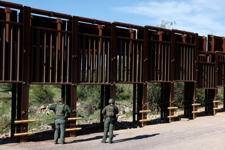 Local law enforcement stands watch as Republican vice presidential nominee U.S. Sen. JD Vance (R-OH) tours the U.S. Border Wall on August 01, 2024 in Montezuma Pass, Arizona. (Photo by Anna Moneymaker/Getty Images)