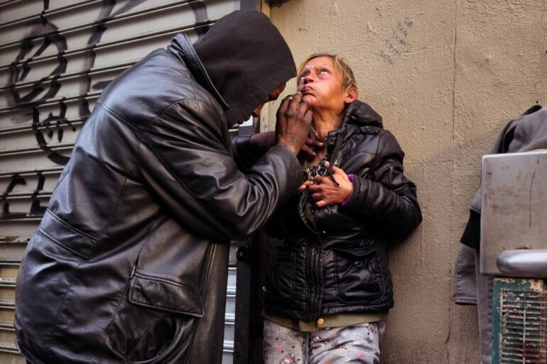 A woman getting injected with drugs at the Hub in the Bronx on Dec. 29, 2024.