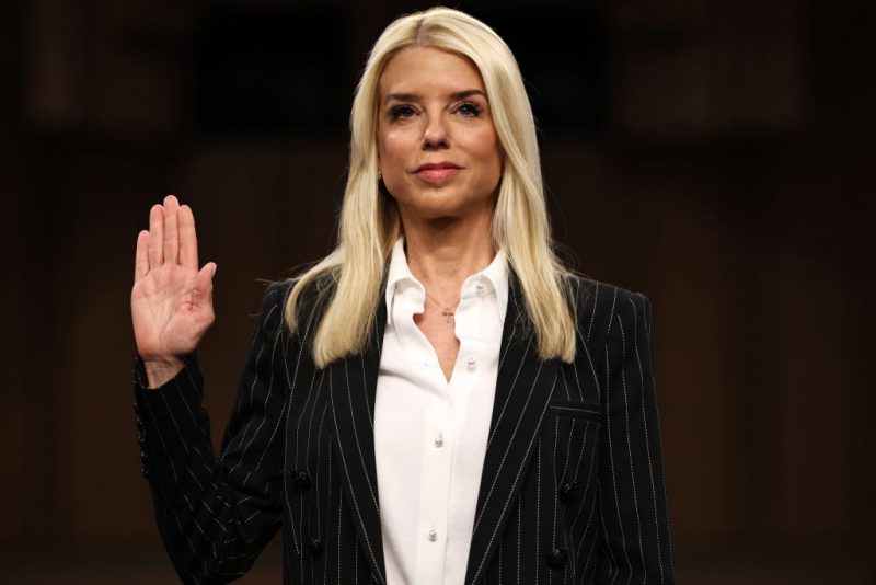 WASHINGTON, DC - JANUARY 15: Former Florida Attorney General Pam Bondi is sworn in to testify before the Senate Judiciary Committee during her confirmation hearing for U.S. Attorney General in the Hart Senate Office Building on Capitol Hill on January 15, 2025 in Washington, DC. U.S. President-elect Donald Trump's nominee, Bondi represented Trump during his first impeachment trial in 2020 and publicly supported false claims that the 2020 election was stolen from him. (Photo by Chip Somodevilla/Getty Images)