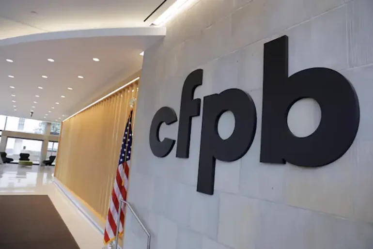 Signage is seen at the Consumer Financial Protection Bureau (CFPB) headquarters in Washington, D.C., U.S., May 14, 2021. REUTERS/Andrew Kelly/File Photo