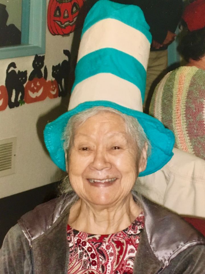 As her dementia advanced, the author's mother became fun, loving and happy, and was adored by the staff of the Lunch Bunch at the local senior center, where this photo was taken.