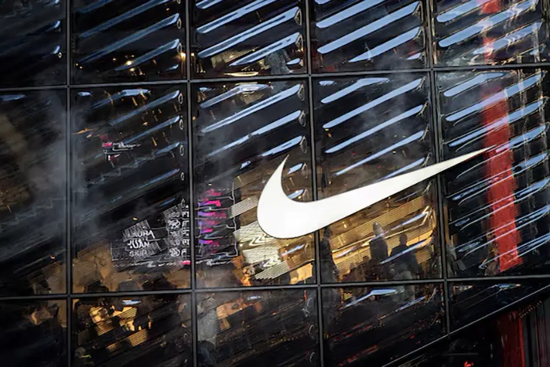 People visit the Nike store at 5th Avenue during the holiday season in New York City, U.S., December 9, 2022. REUTERS/Eduardo Munoz/File Photo