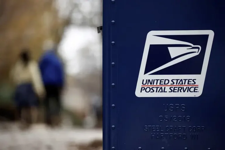 A United States Postal Service (USPS) collection box is pictured in Washington, U.S., December 18, 2024. REUTERS/Benoit Tessier/File Photo