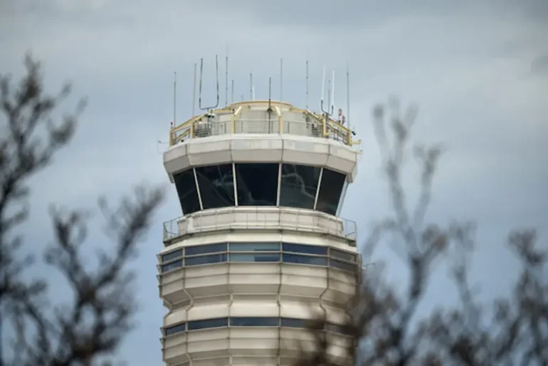 A view of the air traffic control tower at the Ronald Reagan Washington National Airport in Arlington, Virginia, U.S., January 31, 2025. REUTERS/Jeenah Moon/File Photo