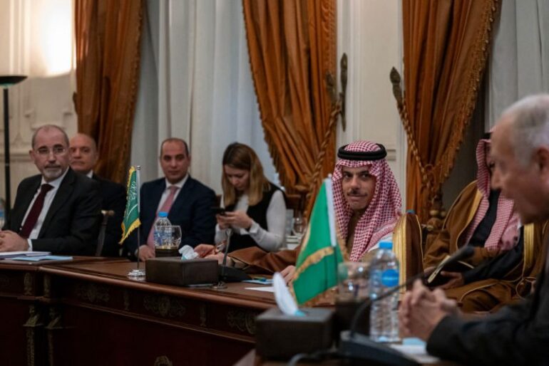 Jordan's Foreign Minister Ayman Safadi (L) and Saudi Minister of Foreign Afairs Faisal bin Farhan (R) take part in a meeting with ministers from Egypt, Qatar and the UAE, to discuss US President Donald Trump's proposal for Egypt and Jordan to host Palestinians displaced from the Gaza Strip, in Cairo on February 1, 2025. Trump insisted on January 28 that Egypt and Jordan would take in displaced Gazans, despite the two Arab nations dismissing his plan to move Palestinians from the territory, a day after Egyptian President Abdel Fattah al-Sisi and Jordan's King Abdullah II rejected any forced displacement of Gazans following the war between Hamas and Israel. (Photo by Khaled DESOUKI / AFP) (Photo by KHALED DESOUKI/AFP via Getty Images)