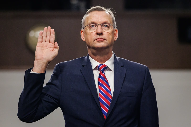 Doug Collins, U.S. President Donald Trump's nominee to be the Secretary of the Department of Veterans Affairs, is sworn in during his Senate Veterans' Affairs Committee confirmation hearing in the Dirksen Senate Office Building on January 21, 2025 in Washington, DC. Collins, a former U.S. Representative and veteran of the Iraq War, has strong bipartisan support and is not expected to face a difficult confirmation. (Photo by Samuel Corum/Getty Images)