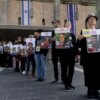 JERUSALEM - FEBRUARY 17: Families of hostages held in the Gaza Strip and supporters hold 73 posters of hostages at the entrance to the Israeli parliament as they demand the Israeli government to continue the next phase of the hostages deal with Hamas on February 17, 2025 in Jerusalem. Families and supporters of hostages being held by Hamas in Gaza are marking 500 days since their capture on October 7, 2023. In commemoration of the somber milestone, campaigners announced a 500 minute fast, to be followed by demonstrations calling for the release of the remaining hostages. (Photo by Amir Levy/Getty Images)