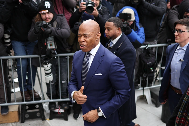 New York City Mayor Eric Adams gives a thumbs up as he arrives to attend a court hearing on the Justice Department's motion to drop criminal charges against him, at federal court in New York City on February 19, 2025. The US Justice Department on February 10, 2025 ordered federal prosecutors to drop corruption charges against Democratic New York Mayor Eric Adams, US media reported. "You are directed, as authorized by the Attorney General, to dismiss the pending charges in United States v. Adams," said the department memo obtained by the New York Times and CNN. (Photo by Charly TRIBALLEAU / AFP) (Photo by CHARLY TRIBALLEAU/AFP via Getty Images)