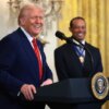 WASHINGTON, DC - FEBRUARY 20: U.S. President Donald Trump, joined by golf legend Tiger Woods, speaks during a reception honoring Black History Month in the East Room of the White House on February 20, 2025 in Washington, DC. The Black History Month celebration comes as Trump has signed a series of executive orders ending federal diversity, equity, and inclusion (DEI) programs and cutting funding to schools and Universities that do not cut DEI programs. (Photo by Win McNamee/Getty Images)