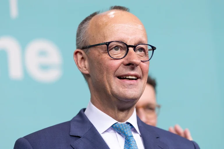 Friedrich Merz, chancellor candidate of Germany's Christian Democrats (CDU/CSU), reacts at CDU headquarters following the announcement of initial results in snap federal parliamentary elections on February 23, 2025 in Berlin, Germany. Germany held elections today following the collapse of the three-party government coalition last November. (Photo by Maja Hitij/Getty Images)