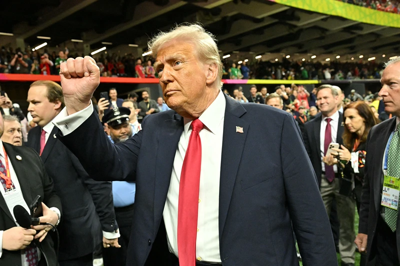 US President Donald Trump visits the field before the start of Super Bowl LIX between the Kansas City Chiefs and the Philadelphia Eagles at Caesars Superdome in New Orleans, Louisiana, February 9, 2025. (Photo by ROBERTO SCHMIDT / AFP) (Photo by ROBERTO SCHMIDT/AFP via Getty Images)