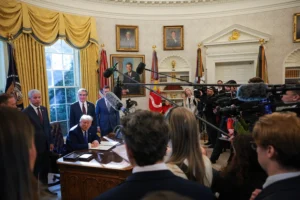 WASHINGTON, DC - FEBRUARY 14: U.S. President Donald Trump speaks to the media after signing an executive in the Oval Office at the White House on February 14, 2025 in Washington, DC. President Trump signed a series of executive orders including announcing that his administration will withhold federal funding from schools and universities that impose COVID-19 vaccine mandates. (Photo by Kayla Bartkowski/Getty Images)