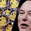 A photo of Elon Musk is displayed on a smartphone placed on representations of cryptocurrency Dogecoin