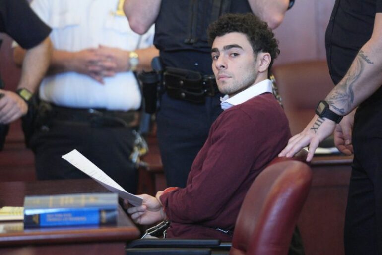 NEW YORK, NEW YORK - DECEMBER 23: Luigi Mangione appears for his arraignment at Manhattan Criminal Court on December 23, 2024 in New York City. Mangione, 26, was arraigned on state murder charges in the killing of UnitedHealthcare CEO Brian Thompson on a Manhattan street on December 4. (Photo by Curtis Means-Pool/Getty Images)