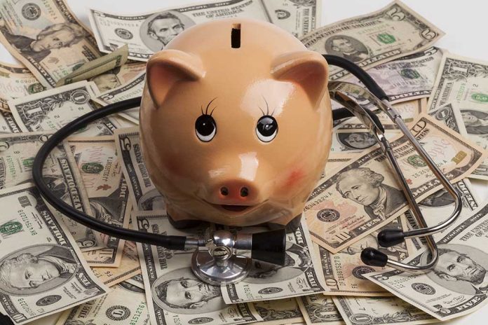 Piggy bank with stethoscope on dollar bills