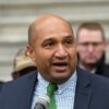 Albany County District Attorney David Soares speaking into a microphone at a news conference about proposed legislation to amend bail reform laws