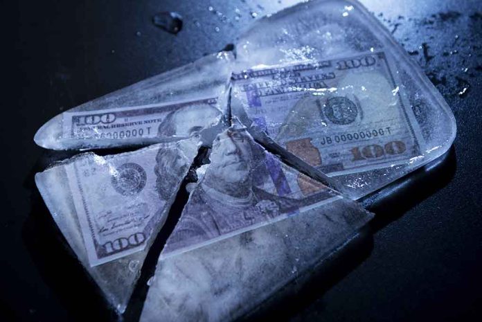 Hundred-dollar bills frozen in cracked ice block