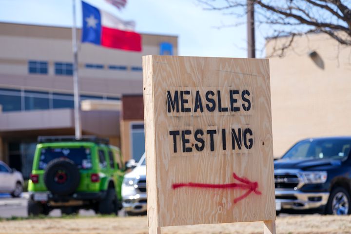 A sign outside of Seminole Hospital District offers measles testing on Friday, Feb. 21, 2025, in Seminole, Texas. (AP Photo/Julio Cortez)