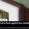 The Samsung Frame TV mounted flush against the wall.