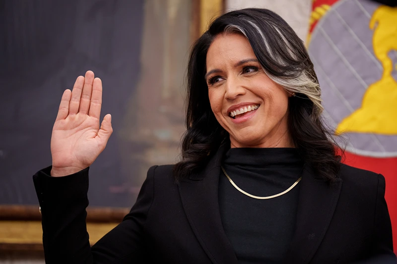 WASHINGTON, DC - FEBRUARY 12: Tulsi Gabbard is sworn in as Director of National Intelligence in the Oval Office at the White House on February 12, 2025 in Washington, DC. Gabbard, who will oversee the 18 intelligence agencies and serve as Trump's advisory on intelligence, was confirmed by the Senate 52-48. (Photo by Andrew Harnik/Getty Images)