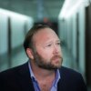 WASHINGTON, DC - SEPTEMBER 5: Alex Jones of InfoWars talks to reporters outside a Senate Intelligence Committee hearing concerning foreign influence operations' use of social media platforms, on Capitol Hill, September 5, 2018 in Washington, DC. Twitter CEO Jack Dorsey and Facebook chief operating officer Sheryl Sandberg faced questions about how foreign operatives use their platforms in attempts to influence and manipulate public opinion. (Photo by Drew Angerer/Getty Images)