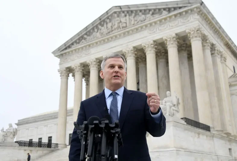 osh Stein, North Carolina Attorney General, speaks in front of the US Supreme Court in Washington, DC, on December 7, 2022 after oral arguments in Moore v. Harper, a North Carolina congressional gerrymandering case. - The US Supreme Court hears arguments in Moore v. Harper, a case that could fundamentally alter the way democracy operates in America, by expanding the power of state legislatures over elections for the White House and Congress. (Photo by OLIVIER DOULIERY / AFP) (Photo by OLIVIER DOULIERY/AFP via Getty Images)