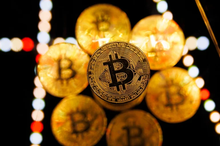 LONDON, ENGLAND - JANUARY 09: In this photo illustration, a visual representation of the digital Cryptocurrency, Bitcoin is seen on January 09, 2024 in London, England. Bitcoin investors are expecting the U.S. Securities And Exchange Commission (SEC) to issue a decision soon on whether to grant Bitcoin "exchange-traded fund" (ETF) approval, which would allow people to invest in Bitcoin without having to buy it on a crypto exchange like Coinbase or Binance. The price of Bitcoin has risen in anticipation of such approval. (Photo illustration by Dan Kitwood/Getty Images)